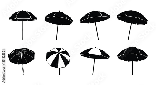 A collection of black beach umbrellas isolated on a white background