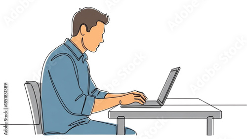 Man working on laptop at desk in a modern workspace