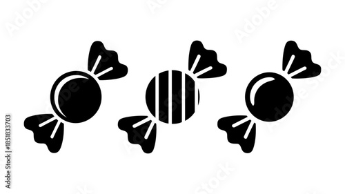 A minimalist black and white icon illustration of three wrapped candies