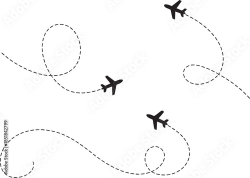 Airplanes tracing whimsical flight paths and a heart shape in the sky