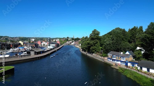 Exeter, Devon, England: DRONE VIEWS: Low angle shots of the River Exe and Exeter Quays showing residential and commercial buildings either side of the river. Exeter is a cathedral city and county town
