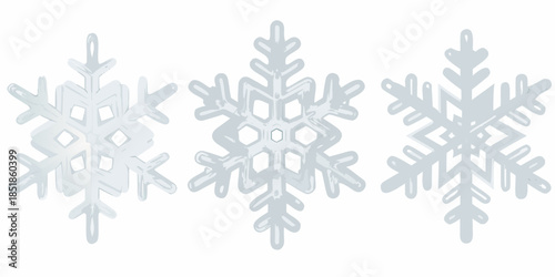 Three delicate white snowflakes displayed in a simple minimalistic arrangement