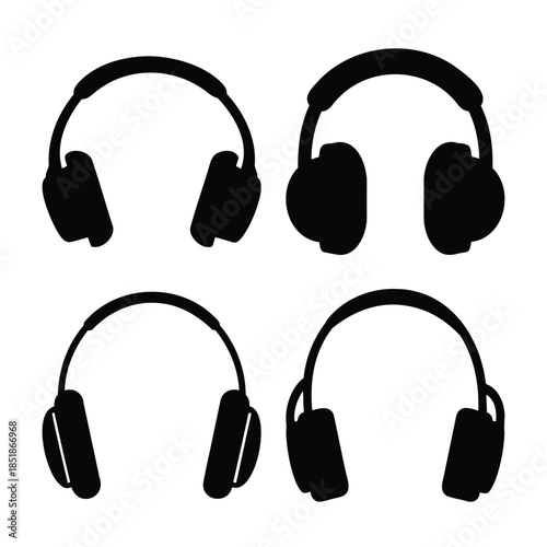Four black headphones icons. music audio device vector set.