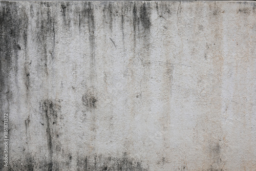 Old weathered cement wall with crack