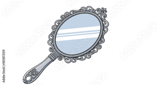 Beautiful ornate oval hand mirror with a decorative silver frame and reflective surface illustrating vintage beauty and elegant personal accessory.