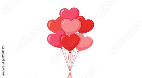 Vibrant bunch of red and pink heart-shaped balloons floating upwards symbolizing love romance and festive celebrations.