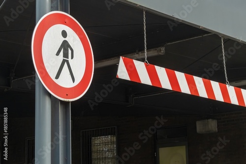 Картината върху платно No pedestrian access sign and height restriction barrier