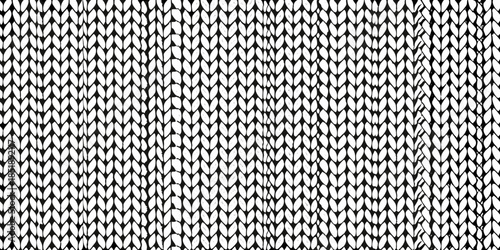 Close up of a textured black and white knit fabric pattern