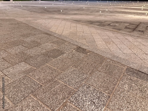 Fotografia Professional installation of stone pavers with integrated LED lighting, executed by expert stonemasons and licensed electricians