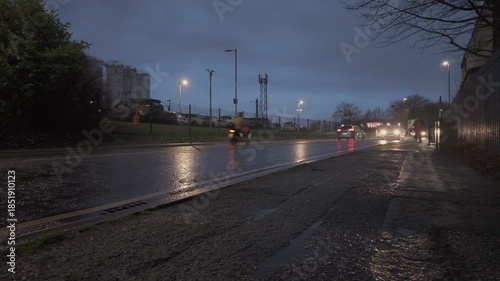 Busy city traffic at night. Cars, street lights. 