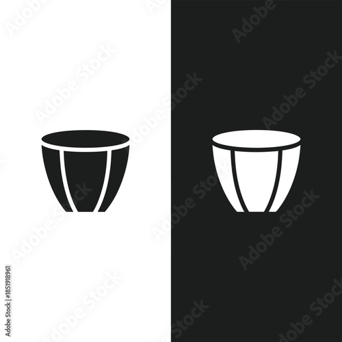 Minimalist drum icon illustration showcasing black and white duality on contrasting backgrounds