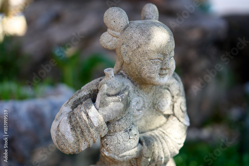 Bangkok, Thailand - 21st December 2025: Close up of Statue at Temple of the Reclining Buddha
