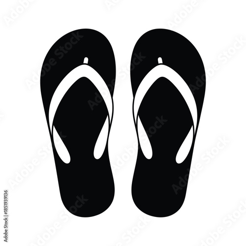 A pair of black and white flip flops a symbol of summer relaxation