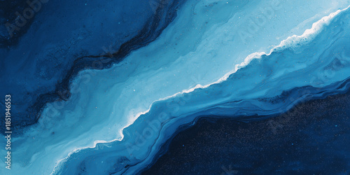 Abstract blue liquid flow art with marble texture and smooth waves creating calming and dynamic visual effect