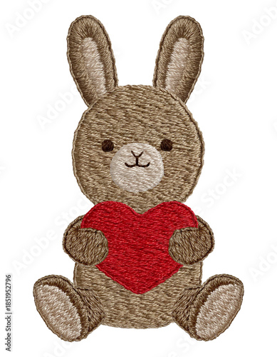 手刺繍のハートを持ったウサギのぬいぐるみ