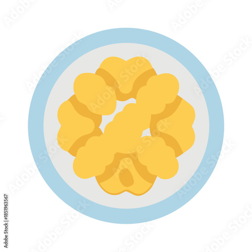 Stylized golden nuggets on a white and blue plate