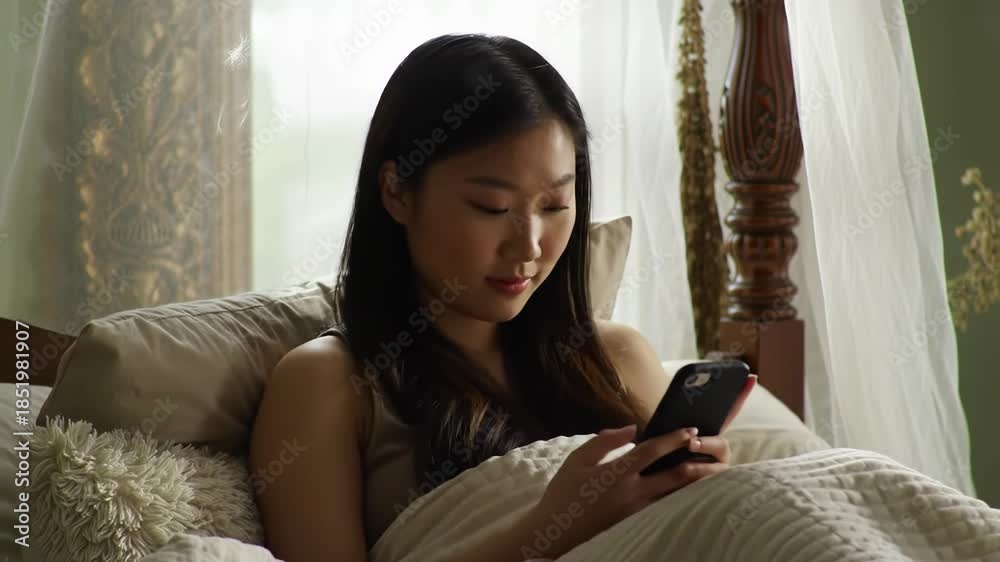custom made wallpaper toronto digitalMorning Routine Asian Woman in Bed, Texting on Smartphone