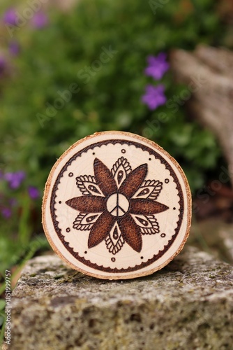 Mandala hand-burned into wood - pyrography
