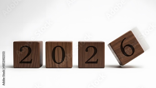 Flipping wood cube changing from year 2025 to 2026