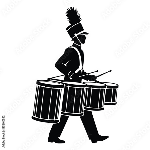 Silhouette of a marching band drummer with three large drums