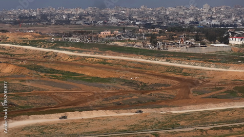 Aerial IDF Merkava Tanks and Humvee Patrol in Gaza
showing IDF Merkava tanks and Humvee vehicles near the Gaza border in 2024.
