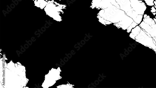 Cracked white shapes on black surface