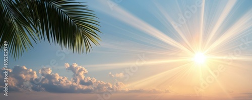 Bright Sunrise Over Calm Water with Tropical Palm Tree Silhouette