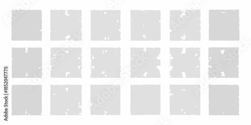 A grid of sixteen light gray squares each with slightly distressed edges