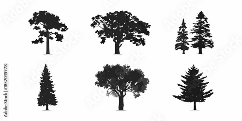 A collection of black silhouette trees of varying shapes and sizes