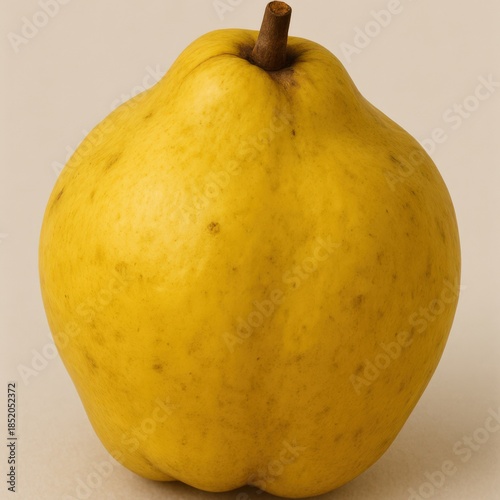Studio shot capturing the radiant yellow hue of a ripe, delicious looking pear.