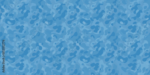 Abstract blue background with irregular shapes and varying shades of color