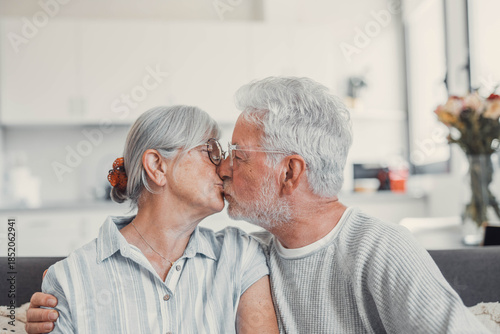 Portrait, smile and senior couple with love, hug and romance with retirement, relationship and bonding. Face, happy mature woman and elderly man embrace, home and marriage with commitment and loving