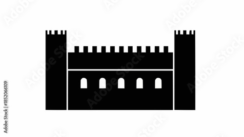 Black Silhouette of a Castle with Battlements and Arched Windows.