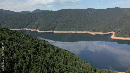 Lake Vidraru in mountains in Romania, aerial view. 