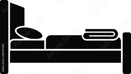 Black silhouette icon of a bed with a pillow and blanket for sleep and rest.