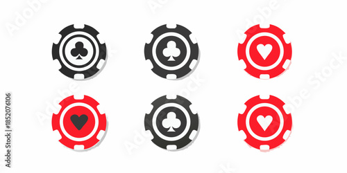 A collection of casino chips displaying different card suits in black and red