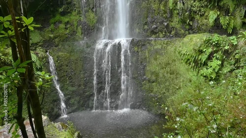  waterfall in a lush green forest in Levada das 25 Fontes, Madeira 