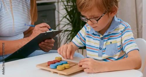 Child Engaged in Educational Activity with Teacher's Guidance