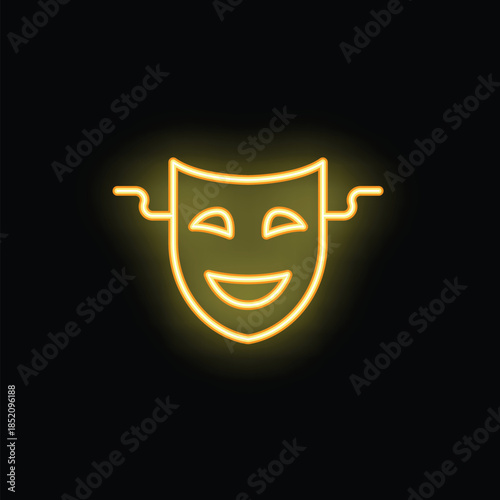Yellow neon sign representing a comedy theatrical mask, glowing on a black background