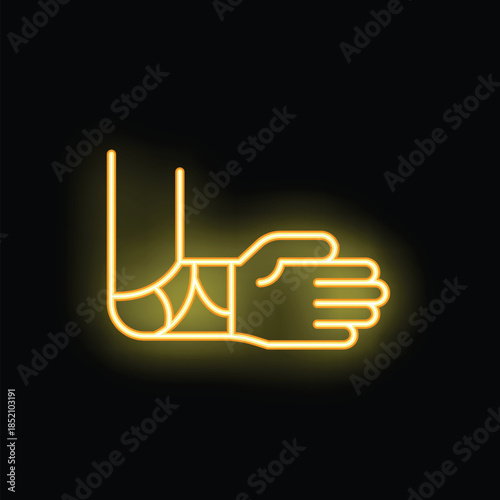 Neon sign of an injured arm with a bandage glowing yellow light against a dark background