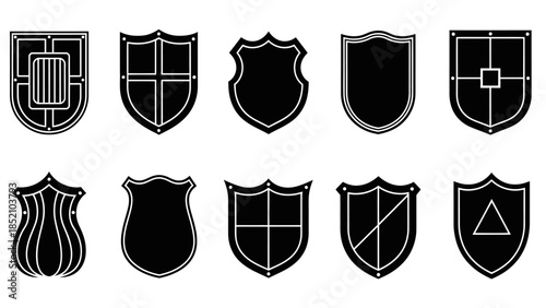 A collection of various black and white heraldic shields with different designs and shapes displayed neatly