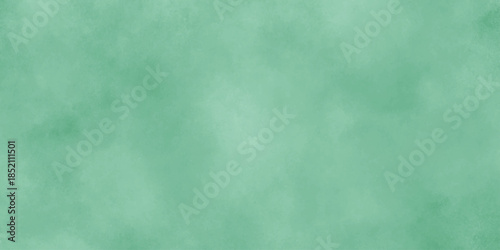 Abstract Elegant dark green background with mottled vintage texture in old fancy background design, texture of colored parchment paper.