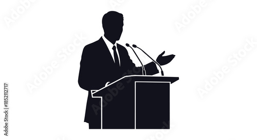 A man giving a speech at a podium a striking black and white silhouette