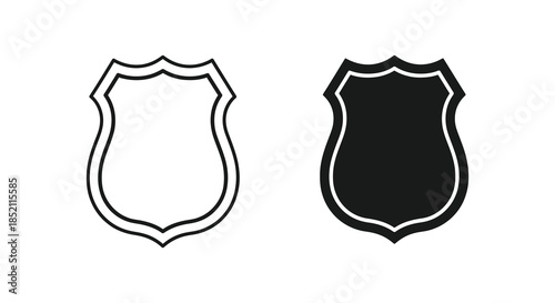 Two ornate shield shapes one outlined and one solid black a striking silhouette