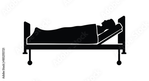A person lying in a hospital bed viewed from the side monochrome silhouette
