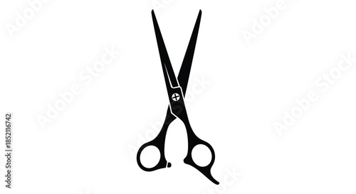A striking black and white image displaying a pair of open scissors silhouette