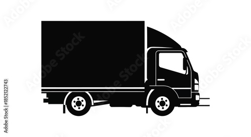 A striking black truck side view detailed wheels and cab design prominent silhouette