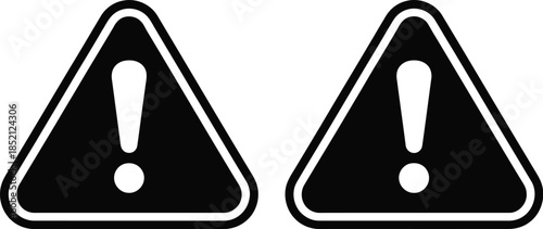 Black and white warning symbols with exclamation marks indicating caution or danger