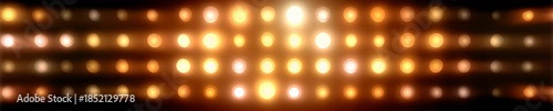 Wall of flashing round incandescent light bulbs on black background. Retro stage lighting grid video background, banner. 