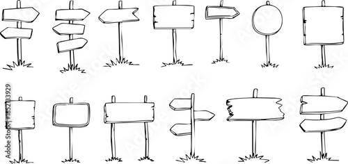 Blank Signposts and Directional Signs on Grassy Areas